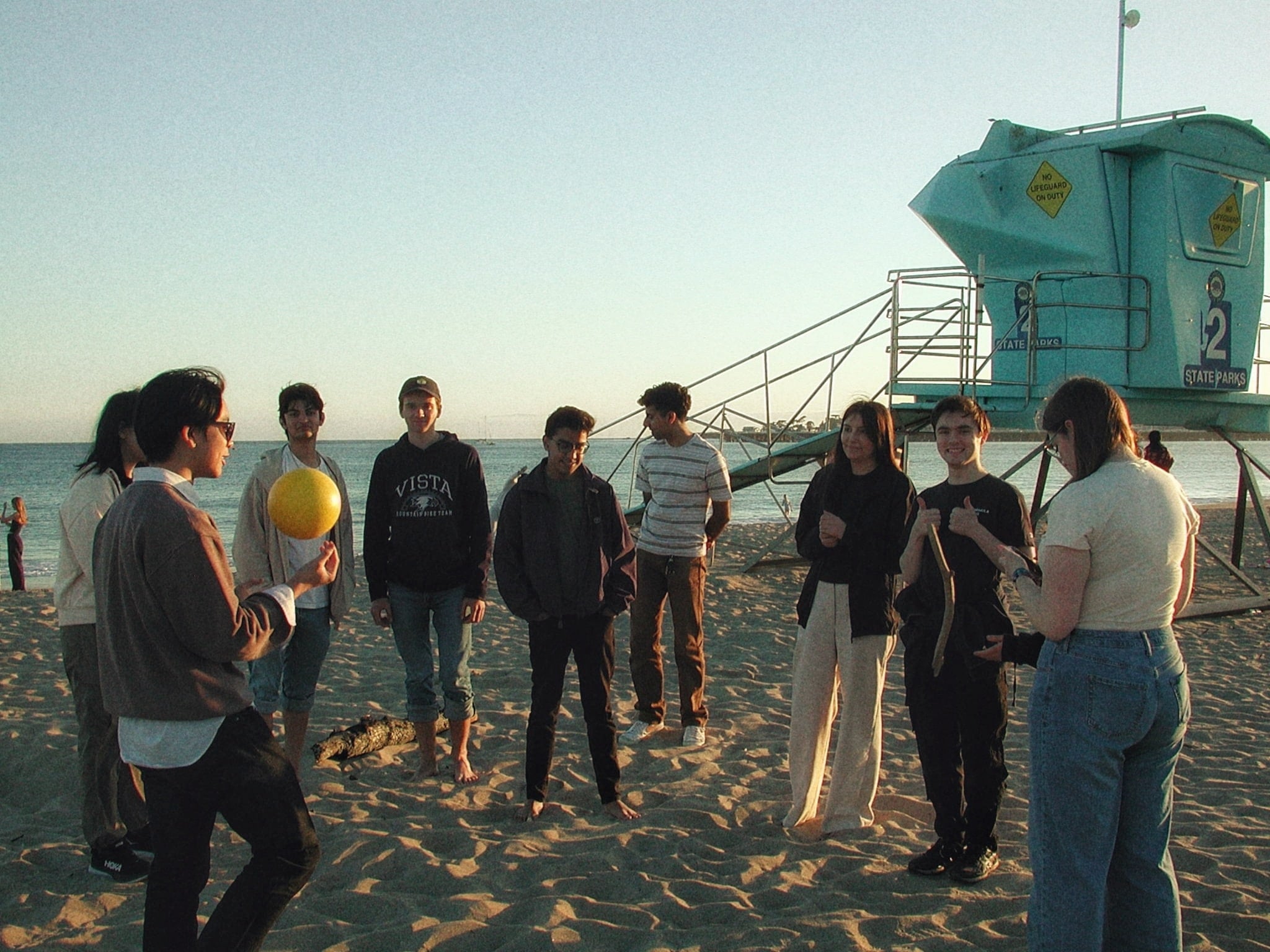 Team Members Have a Club Outing at the Beach