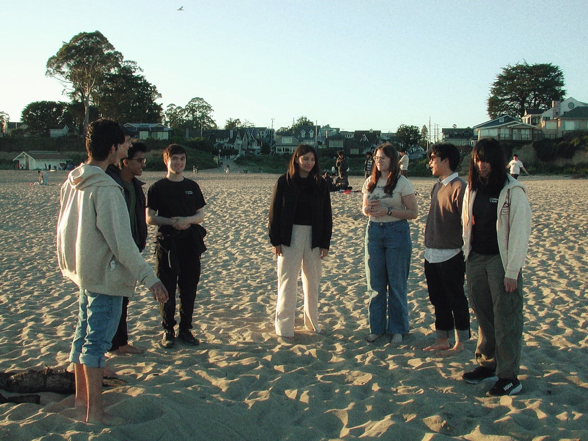 Team Members Have a Club Outing at the Beach